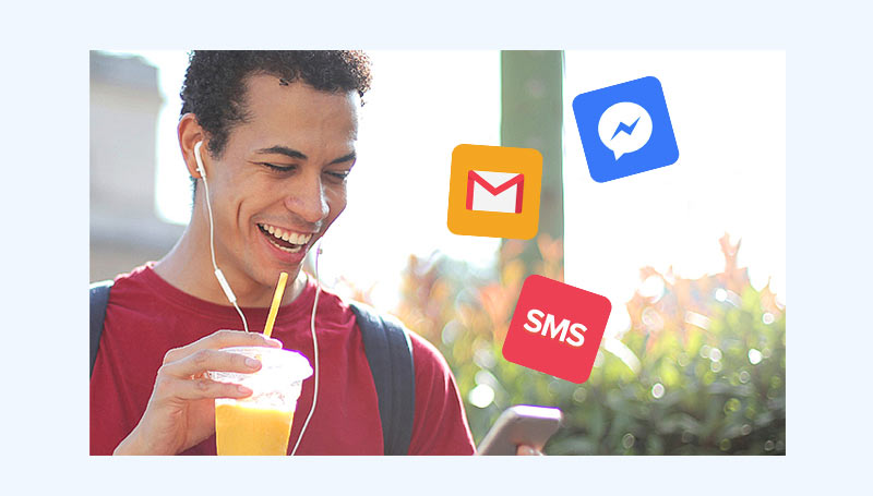 Man with phone showing email, SMS and Facebook Messenger logos